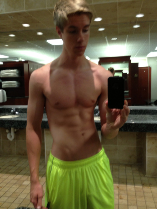 just-a-twink-again:  changing-room hottie… love the pic of him in the green shorts <3 