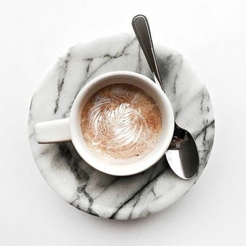{Morning cup on marble. Happy Tuesday!}
