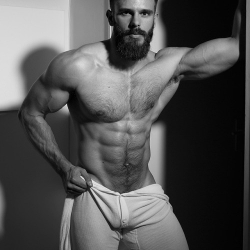 Killian Belliard is the muscled bearded man by definition