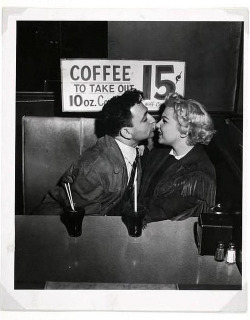 coufuckyeahvintage-retro:  Man and woman kissing at drug store, 1948 © Weegee 