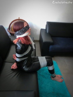 sashalee-kong73:  Taped in Catsuit on Sofa