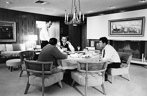 deannmartin:  Dean Martin, Frank Sinatra, and Mack Gray share a meal together with other guests, c. 