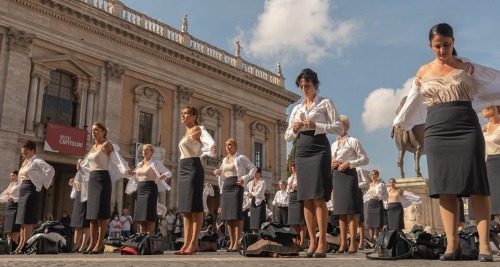 the-leeannemontgomery:noiredesire: Alitalia flight attendants strip in Rome protest against ITA Airw