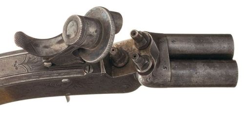 A pair of all metal three shot percussion pistol crafted by William & John Rigby of Dublin, Irel