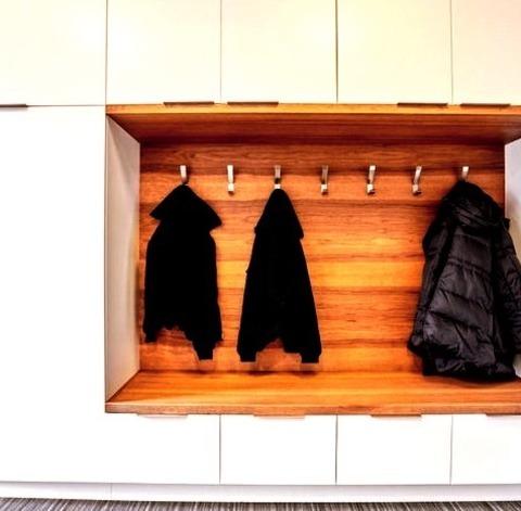 Multiuse Laundry In DetroitMid-sized Utility Room Design From The 1960s With A Stacked Washer/dryer,