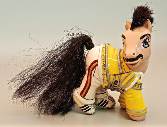 Everything sucks, we’re all going to die of communicable diseases and we’ll probably never be as fluent in Russian as our new overlords would like, so here’s a picture of a Freddie Mercury My Little Pony. [via Etsy]