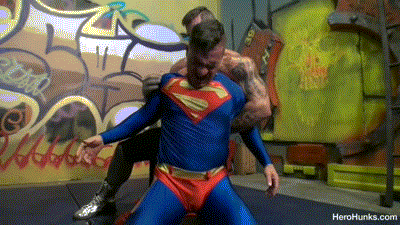 Ultraman ambushes Superman with kryptonite, then humiliatingly strips the Man of Steel, piece by pie