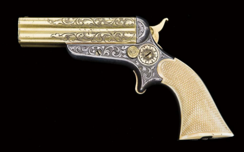 Engraved Sharps Hanking Model 3a four barrel derringer with checkered ivory grips.  Mid 19th century