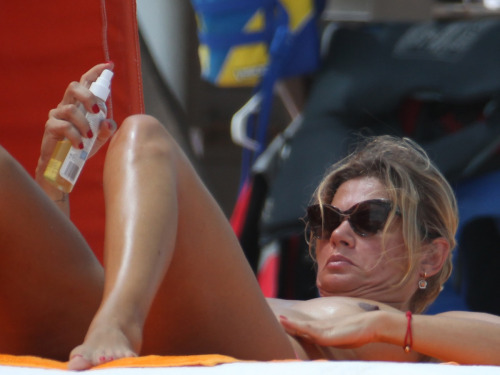 toplessbeachcelebs:  Katarina Vasilissa (Polish Model) sunbathing topless in Miami (May 2014) 