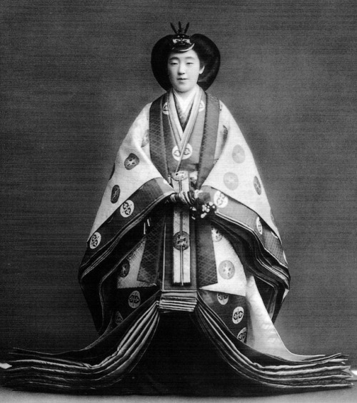 Empress Nagako in layers of silk Court kimono.  Photograph taken in 1926, Japan.  Image via Pinteres