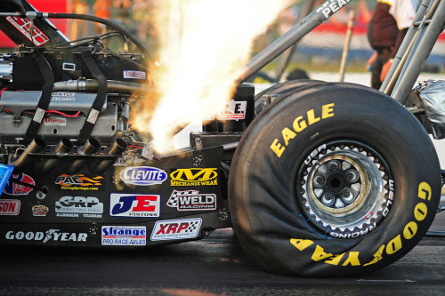 thealgerian:Drag racing car tire mid-launch