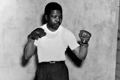 the-history-of-fighting:A young Nelson Mandela doing some boxing training.&ldquo;Boxing is egali