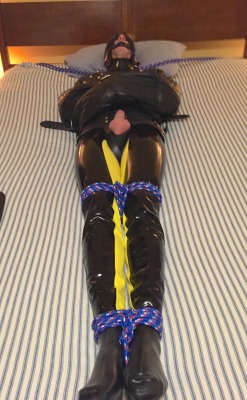feelingknottycda:  Total coverage - Step #4.  Our boy was overheating with all the layers and the neoprene gas mask, so I swapped out the mask for a gag and blindfold in today’s #TiedUpThursday photo.  And I’ve added ropes securing his shoulders
