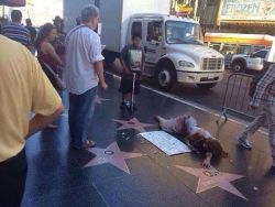 twinkletwinklelittletit:  salou-desu:  At Hollywood Walk of Fame, a Spanish girl protesting for #gaza u don’t have to be muslim to see the pain, u just need to be human…  I’m surprised this is the first I’ve heard of this girl. 