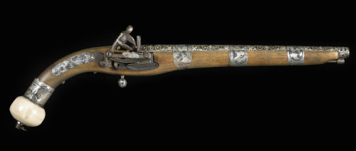 Silver and Ivory mounted 19th century miquelet pistol of Caucasian origin.