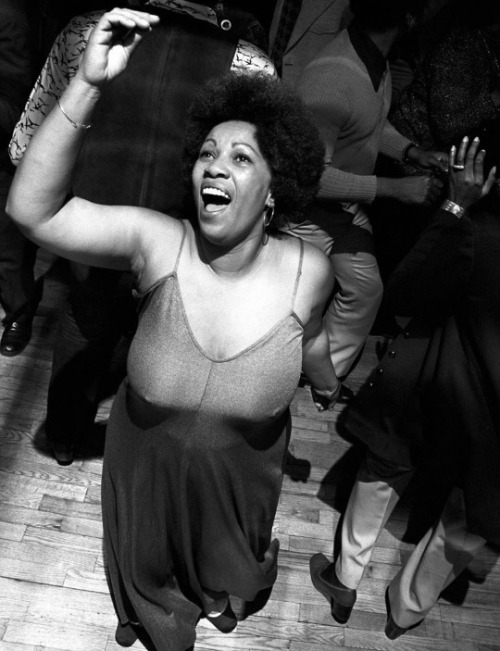 accras: Toni Morrison dancing at a disco party in New York. March 5, 1974. Photographed by Waring Ab
