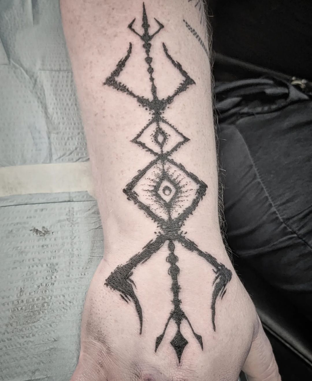 Andy Howl - Runic design based loosely on the clients...