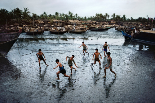 africansouljah: Steve McCurryBURMA. Sittwe. 1994. Boys playing football.