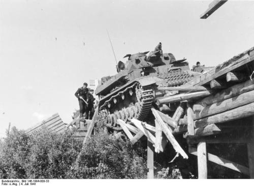 historicaltimes:  German Tank almost falls off a Russian bridge 4 July 1941 Read More 