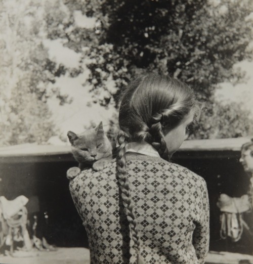 Happy belated birthday, Elizabeth Bishop. Photograph by Louise Crane of Bishop and her cat, Minnow. 