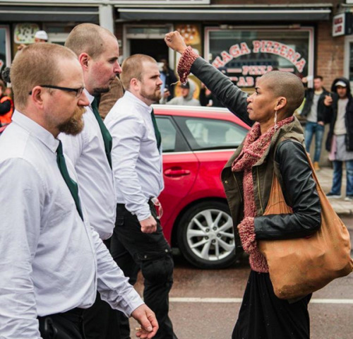 dangerousdykes:Swedish activist Maria-Teresa Asplund standing up to neo-nazis who were allowed to march under police protection on May Day. Photo by David Lagerlöf
