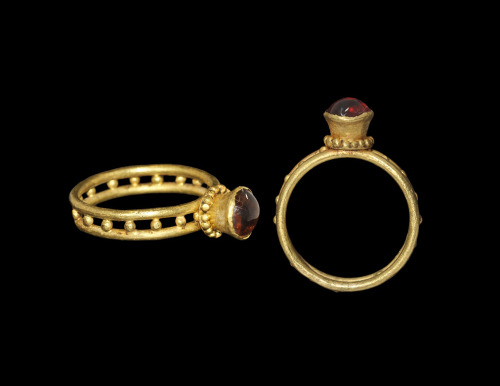 3rd-4th century CE gold and garnet Roman ring. From Timeline Auctions.