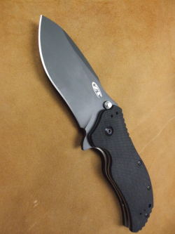 gunsknivesgear:  The Zero Tolerance 300 is a tank in knife form.  Its thick blade can take tremendous abuse.   
