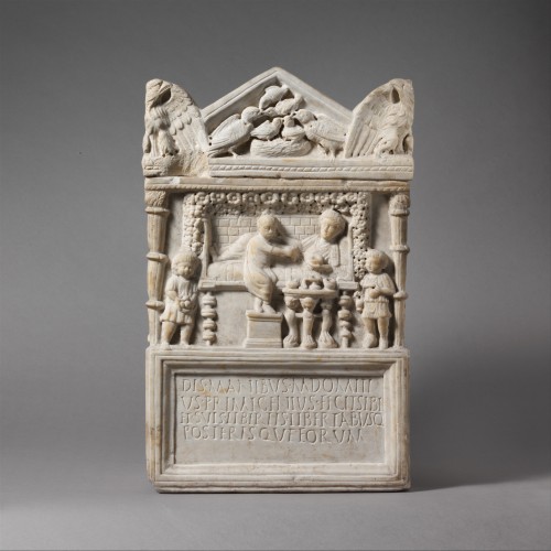 apuleiaprimilla: Marble cinerary chest with lid. Above the inscription is a scene in which the decea