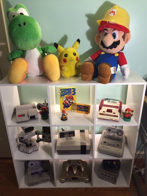 Picked up the Famicom and gold N64 in Japan, so I rearranged a little to be able to put them in a ni