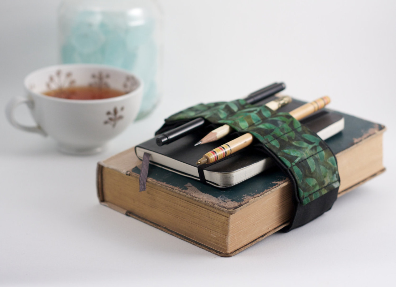stuffguyswant:Handmade Journal Bandoliers by Emily Oinen  Designer Emily Oinen from
