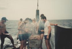 stunningpicture:  I found a photo of my Dad cooking a barbecue on top of a moving Submarine 