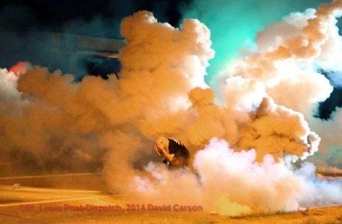 citizen-earth:  Police in Ferguson are attacking people with tear gas and rubber bullets. They are arresting and firing on journalists. They are showing a complete disregard for the First Amendment, human rights, and the lives of the community. 