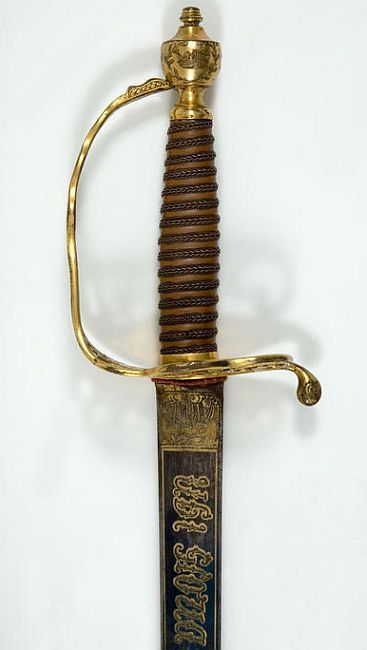 art-of-swords:Naval Presentation SwordDated: 18th century (1780-90 hilt)Culture: German blade of French type, English hiltMedium & Technique: blued etched and giltInscription: ‘SOLINGEN’ and in Latin and FrenchSource: Copyright © 2015 The Fitzwilliam