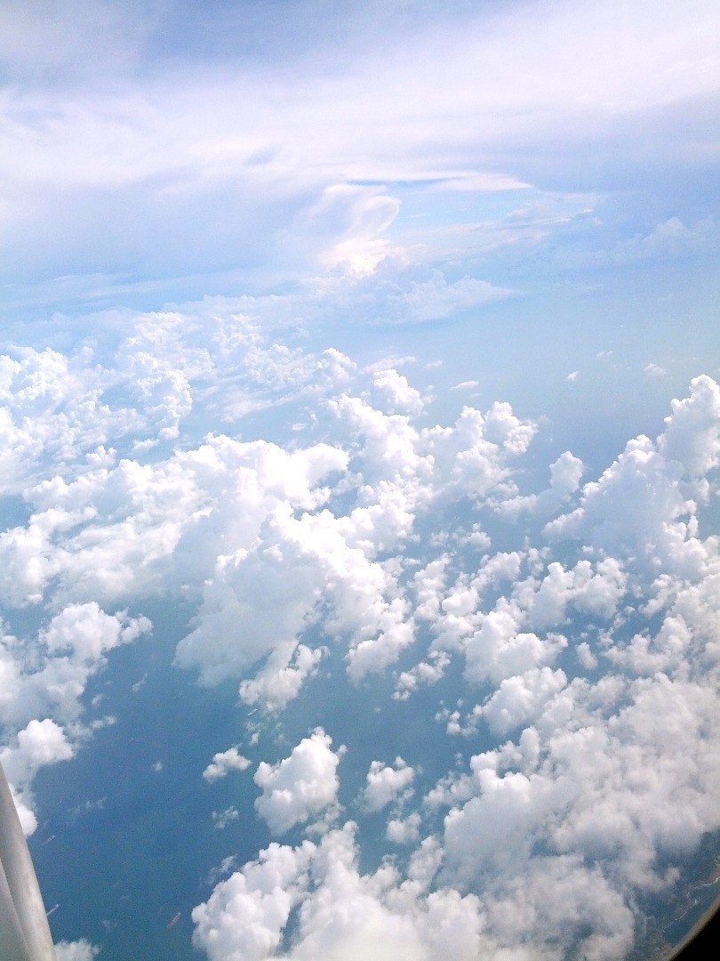 disappearance:  the clouds when leaving hk were gorgeous 