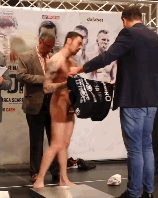 notdbd:Boxer Ben Hall has to strip naked as he weighs in - he has a big smile on