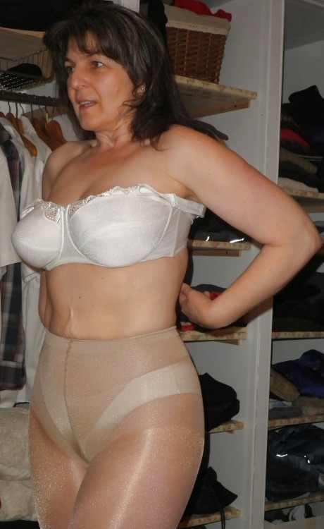 Mature woman in bra and panties