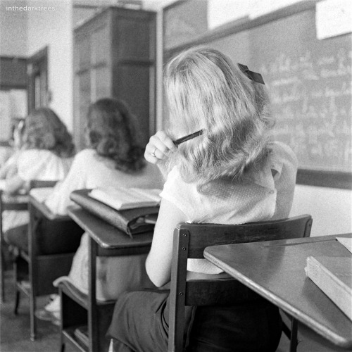 inthedarktrees:In class a comb appears, though Mrs. Post frowns at public primping. Nina Leen, “Tulsa Twins,” Life, August 4, 1947