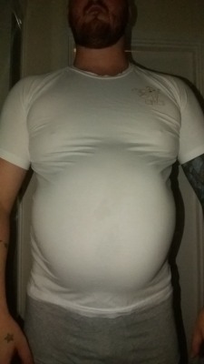 jeezy-creezy-mcfeeny:Once he reached his sixth month. He couldn’t stop his shirts riding up his gut. 