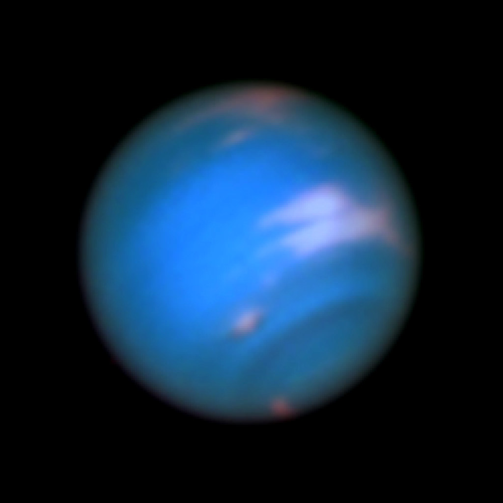 Hubble Sees New Dark Spot on Neptune by NASA Hubble