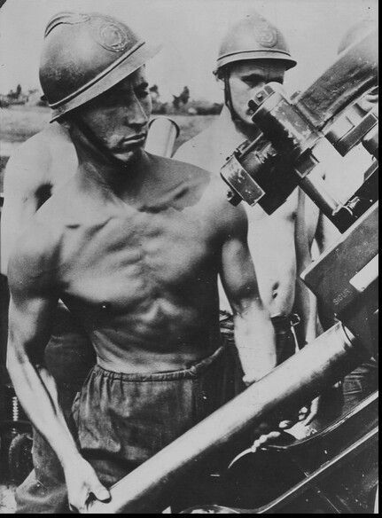 Lean and muscular French artillerymen, World War II.