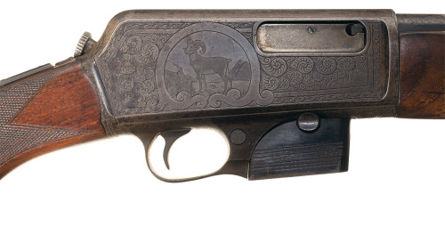 Factory engraved Winchester Model 1907 semi automatic rifle, early 20th century.