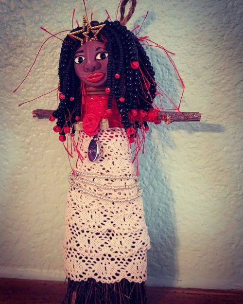 This is a Louisiana Broom doll. In Louisiana, the broom is a symbol of health and fertility. It also