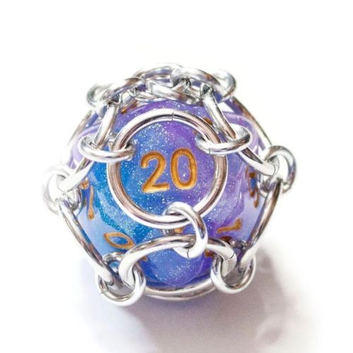 I love the colours in the latest addition to my #etsy shop: Blue and purple shimmer captive d20 dice