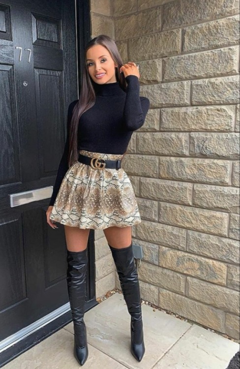 I ❤️ her sexy beautiful legs in knee high boots and shiny stockings, and cute mini skirt.