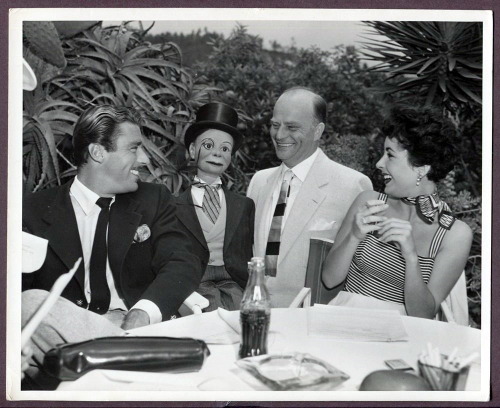 Peter Lawford, Charlie McCarthy, Edgar Bergen, and Elizabeth Taylor, ca. 1952.