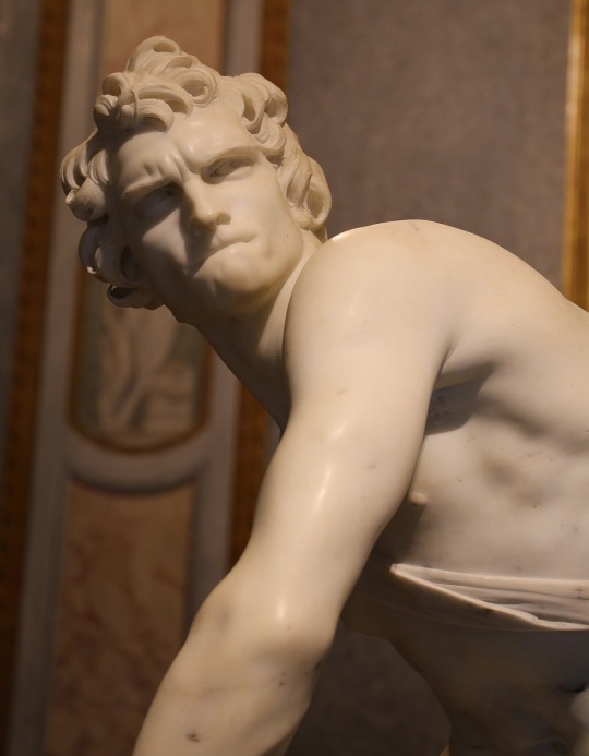 m1male2:David by Gian Lorenzo Bernini (1598-1680) one of the greatest baroque geniuses of his time.  Made in marble, the sculpture dates from 1623-24.  The work was commissioned by Cardinal Scipione Borghese, one of the sculptor’s patron and is