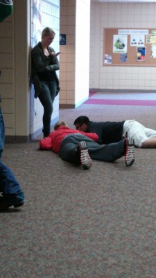 yodelexa:  i was waiting in the hall to go into my class after lunch and this girl walked out of the bathroom and then all of a sudden everybody hears this big thump and i look over and these two guys fell to the floor in front of the girl’s feet and