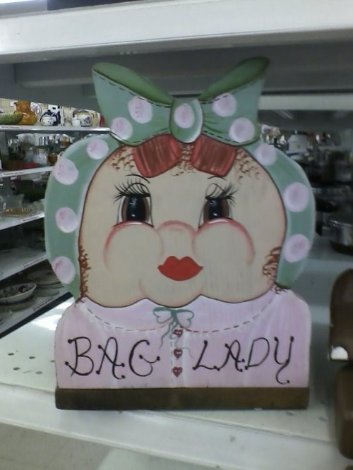 shiftythrifting:“Bag Lady”. What more can be said? Please tell me this is a holder for all the ridic