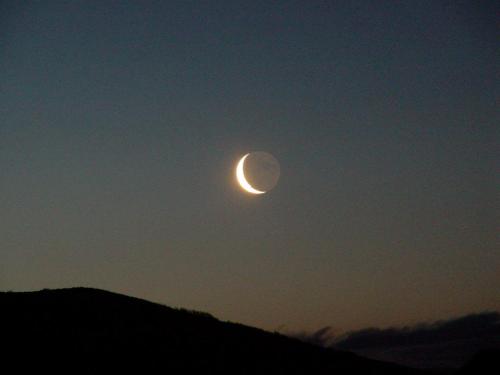 This is a photo of earthshine; also known as the Moon&rsquo;s ashen glow or as the old Moon in the n