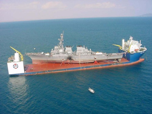sixpenceee:  Heavy-Lift Ship  A heavy-lift ship is a vessel designed to move very large loads that cannot be handled by normal ships. This is the Blue Marlin, a semi-submerging vessels capable of lifting another ship out of the water and transporting